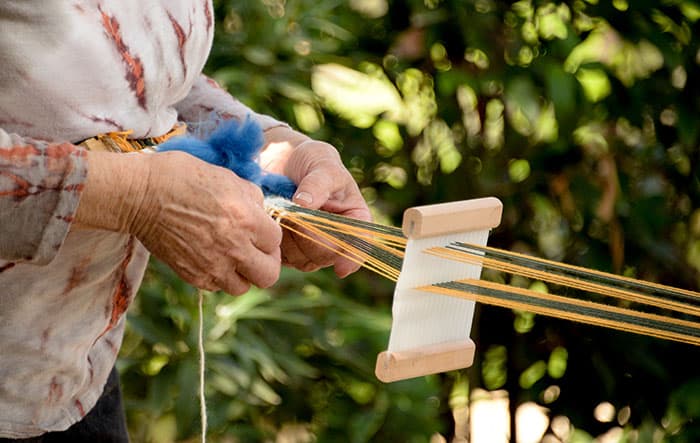 Weaving on a backstrap loom