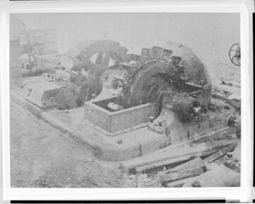 A Pelton wheel and a generator under construction at Santa Ana River #1 Hydro Plant