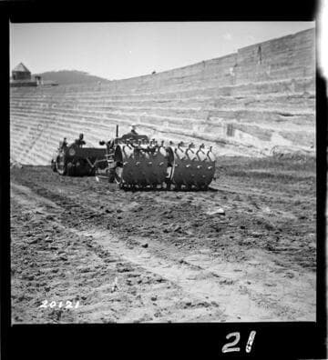 Sheepsfoot roller in Operation Backfill Dam 1 East end