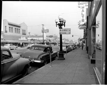 Street lighting in a business district during the day