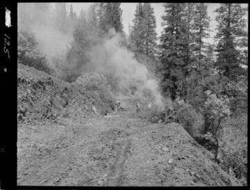 Big Creek - Mammoth Pool - Burning brush on Dam access road