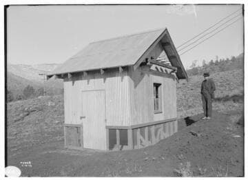 Kern River No. 3 - Headquarters Camp - Substation with a man in a three