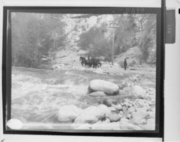 Horsemen along the Santa Ana River transmission line