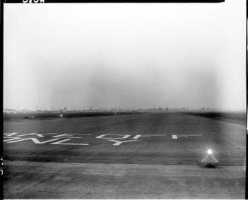 End of airport runway with runway lights