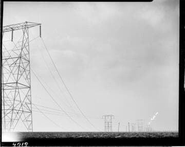 Pulling conductor through towers