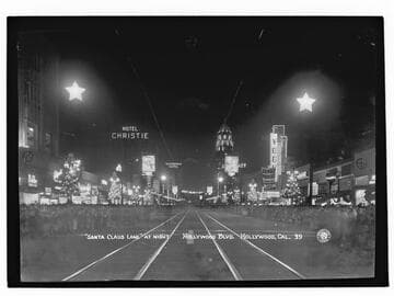 "Santa Claus Lane" at night, Hollywood Blvd, Hollywood, Cal