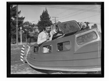 Sergeant Burgess with Miss Iona boat, Santa Monica