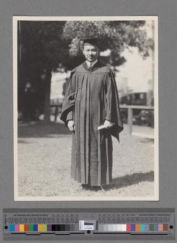 Peter SooHoo, in cap and gown, graduating from University of Southern California