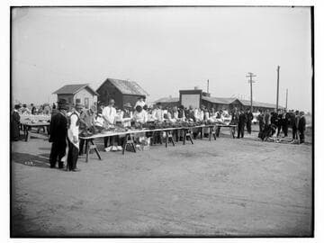 Men carving turkeys, Thanksgiving, Fairmead