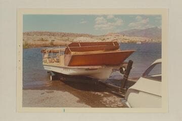 The deck boat on the trailer at Temple Bar Wash