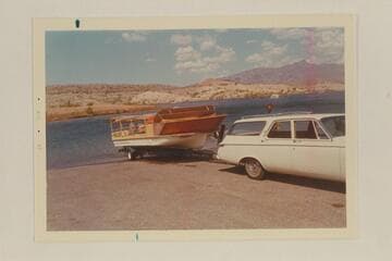 The deck boat on the trailer at Temple Bar Wash