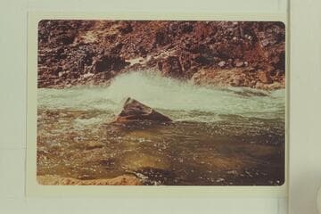 Mack Miller's Turbocraft in a cloud of spray in Gneiss Canyon Rapid