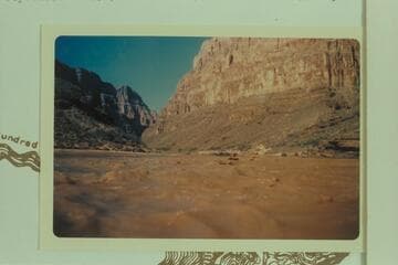 Homer Morgan floating on his air mattress about Mile 211