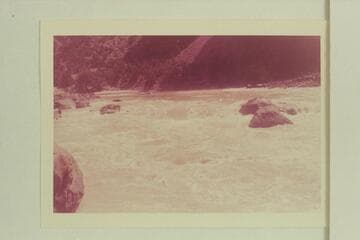 Upper Disaster Rapid.  Bill Davis has dropped over the top along the right bank.  Mildred Davis is following