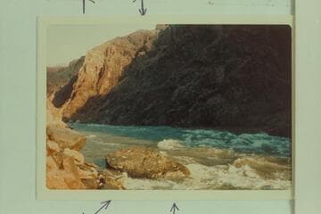 Rapid 231.  Arrow a-a, rock in middle beginning to show.  Arrow b, rock with "cushion wave"