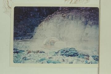 The helicopter about to take off from the beach at 217 Mile Rapid.  Note the Yak on the side