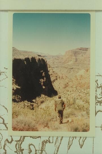 Harvey Butchart going down tributary canyon to Granite Park