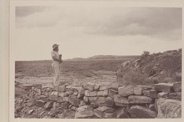 Harry Aleson standing on built-up section of shoulder of Stanton road