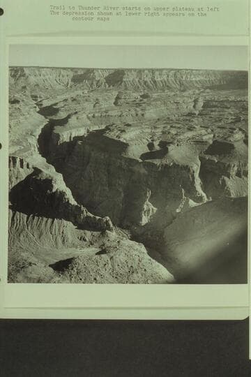 Vaughn Spring and source of Deer Creek.  Trail to Thunder River starts on upper plateau at left.  The depression shown at lower right appears on the contour maps