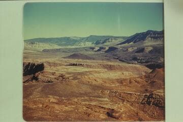 Looking up Queantoweap Valley also known as Hurricane Ledge Valley.  Upper left is Mt. Trumbull and upper center is Mt. Logan.  The peaks of Mt. Emma can be seen above the cliffs upper right
