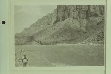 Beaching the sadiron after portage and lining Wright-Stavely party at Hance Rapid