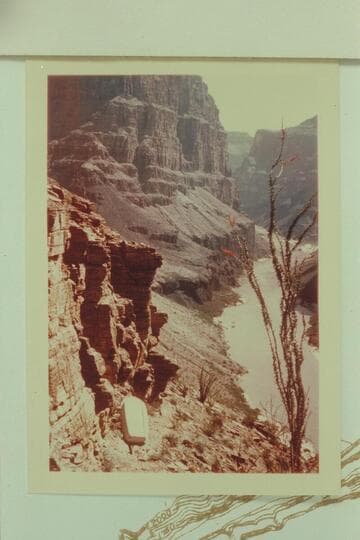 Sportyak carry down Whitmore Trail; view is up river