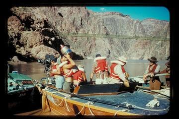 Camera boat at suspension bridge
