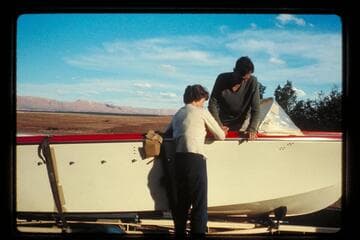 Hamiltons check boats; Cliff Dwellers Lodge