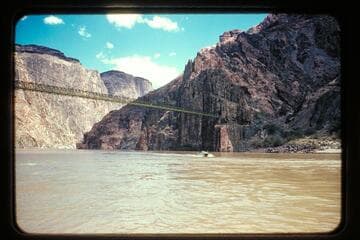 Camera boat at suspension bridge