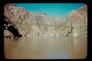 Camera boat at suspension bridge