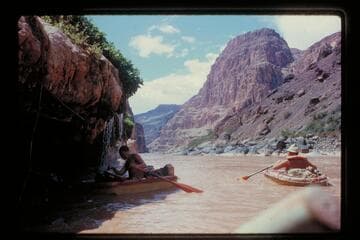 Buzz in spring; Bill Belknap on river opposite springs below Vulcan Rapids