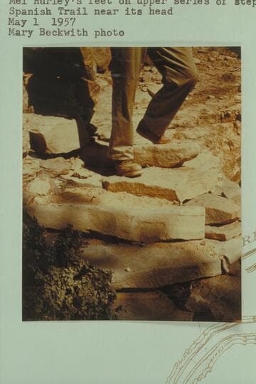 Mel Hurley's feet on upper series of steps.  Spanish Trail near its head [on reverse of photo:  "No. 2 Mel's feet on a close of the upper series of Spanish Steps just at the head of the trail, starting down to the Bottom"