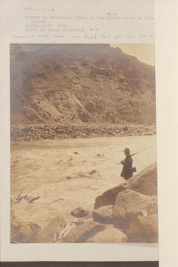 Mile 211.6.  Arthur O. McCormick looks at the third Rapid in Cataract Canyon