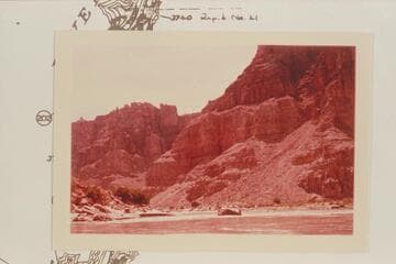 Down from the river at the mouth of Wide Valley at Mile 205.35.  The mouth of Range Canyon is at left