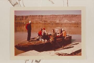 Tex's jet "Major Powell" about to leave Moab for The Junction.  Louisa Arps, Helen Stiles, and Dock Marston in front cockpit; Connie Caouette holds the line