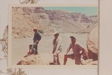 Crew of Harris-Brennan party looksee One Mile Rapid.  Mile 204.8