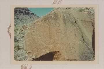 Boulder marking for USRS bench mark at about Mile 216.2 at right bank of head of Cataract Canyon