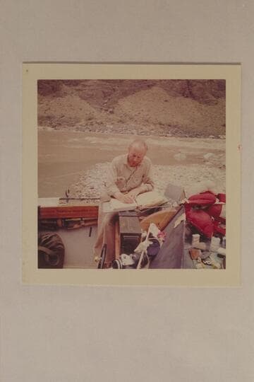 Jim Algar studies the script for the making of Disney's "Ten Who Dared."  Grand Canyon