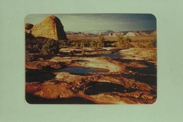 Pools in the slickrock enroute to Hawkeye Arch.  Bisha Canyon, tributary to the San Juan River, Navajo Reservation in Utah