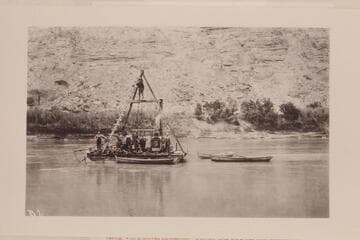 Drilling at the damsite below the mouth of the Green River.  Mile 216.35