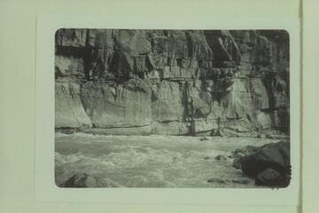 Bill Davis in Triplett Rapid.  Photo from left bank