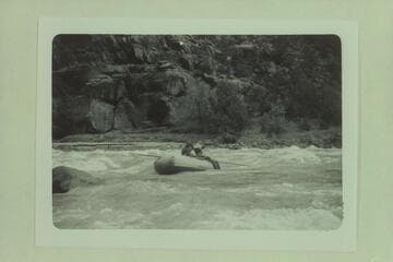 Mildred Davis pulls out below No Name or Harp Rapid; Canyon of Lodore.  Fern Davis rides as passenger.  Photo from left bank