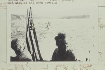 The Nevills sadirons and Aleson's outboard astern of the Park Service launch leaving Pierces Ferry;  Moe Nevills and Norm Nevills