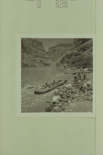 13.  Lava Falls.  Lining Pontoon No. 1.  Boat:  Bruce and Clarke.  Shore:  Jack, Dick, Smuss, Harry, and Doug