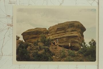 Jane Julien and two of the boys at the rock near Whiterocks on which Denis Julien inscribed his name and the date 1831