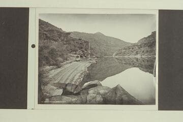 Green River at Brown's Hole, Daggett County, Utah, showing clear reflections of mountains on the water
