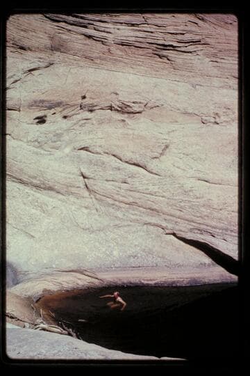 Bill Belknap in pocket below dridge near Baker's Ranch