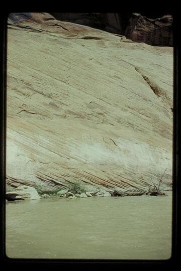 Where old road is cut away, San Juan River