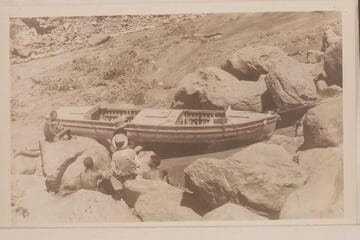 The "Coronado" being portaged at Vulcan Rapid by the Eddy crew
