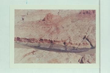 Glen Canyon at Mile 62 showing the butte at end of Cummings Mesa